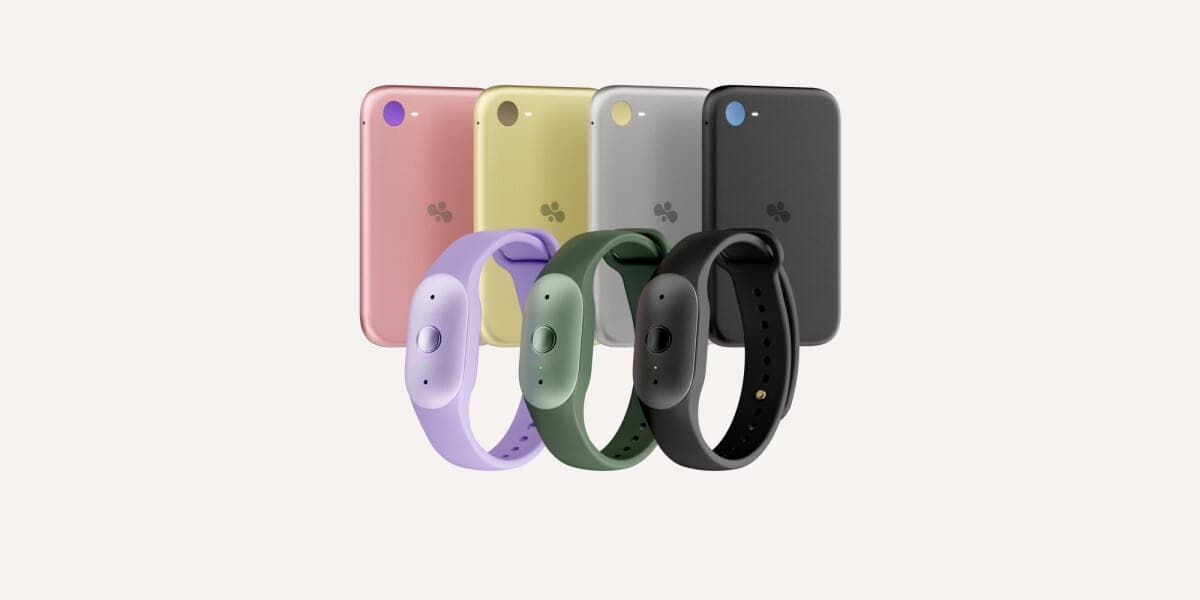 Three Bee Frontier wristbands in lavender, green and black in front of four Bee Eclipse phone attachments in pink, yellow, silver and black