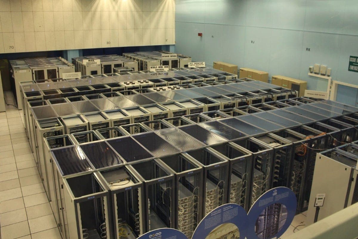 Rows of server racks and cabling inside a data center