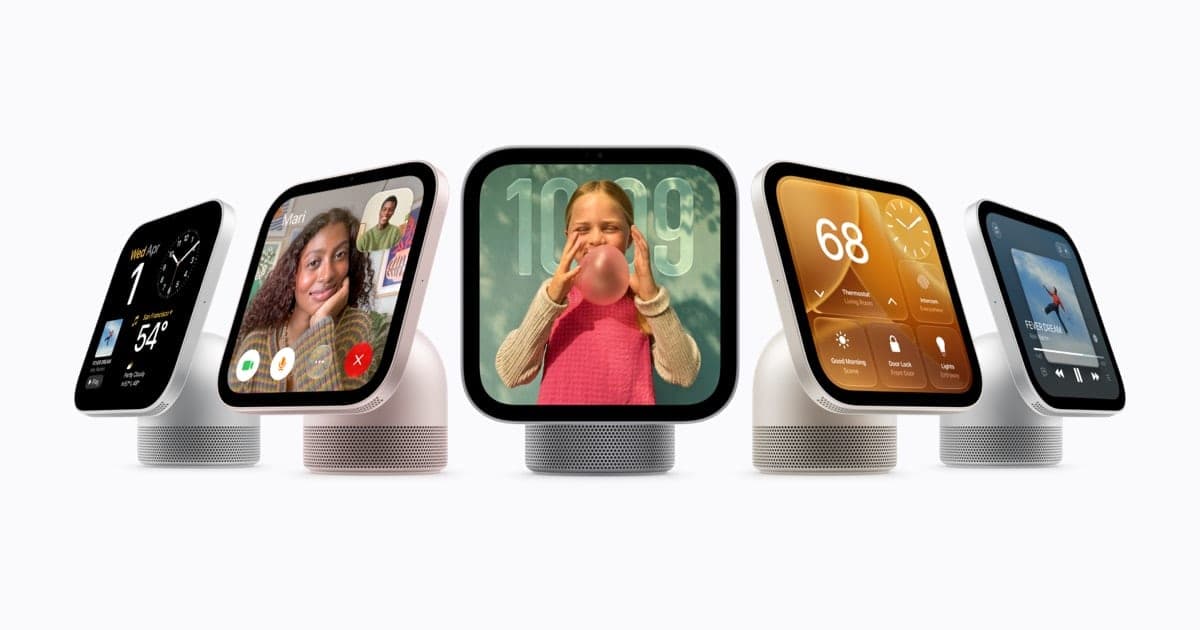 Five Apple HomeView smart displays in a row on speaker bases, showing a clock, a FaceTime call, a photo of a girl blowing a bubble, home controls and a music player