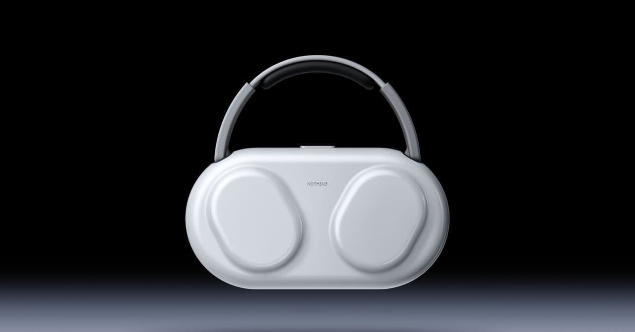 The Nothing Headphone (1) Pro's white carrying case, shaped like the headphones themselves with a curved carry handle, shown against a dark background.